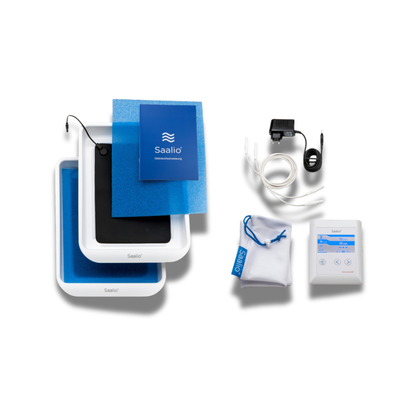 Saalio iontophoresis device and accessories, including trays, cables, and a control unit, displayed on a white background.